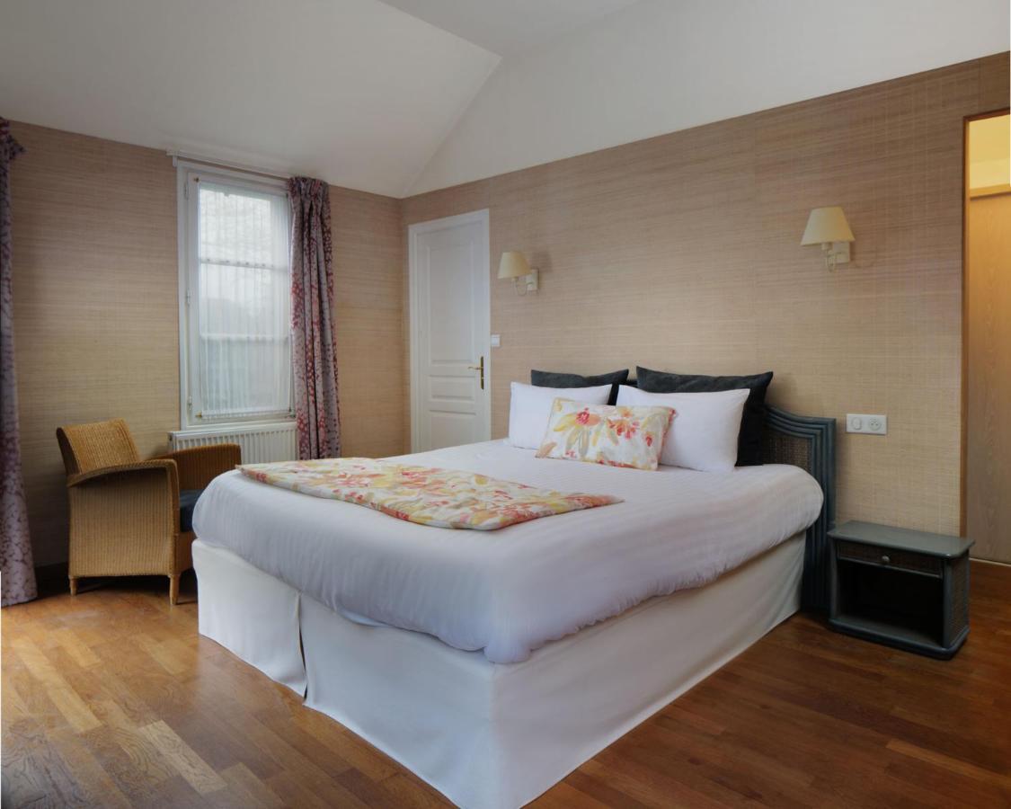 Logis Hotel Les Fuchsias Saint-Vaast-la-Hougue Exterior foto